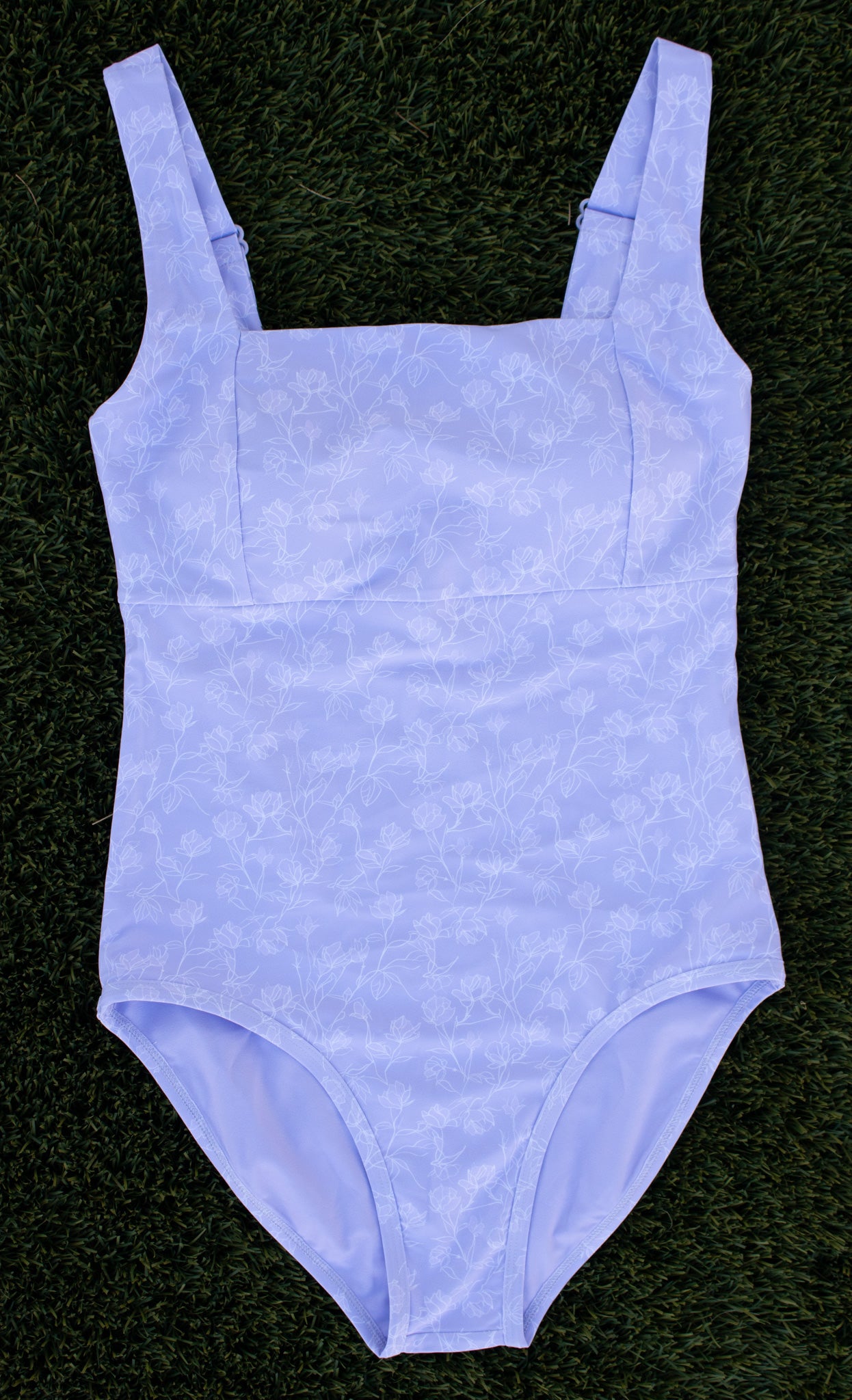 Modest one-piece swimsuit with full coverage, stylish design front view